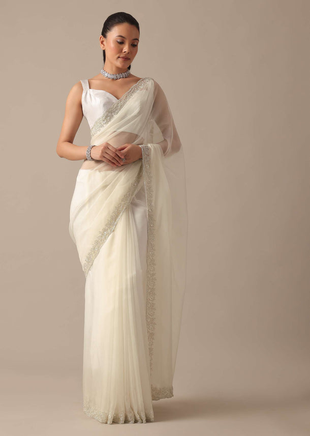 White Sheer Organza Saree With Scallop Cutwork And Unstitched Blouse Piece
