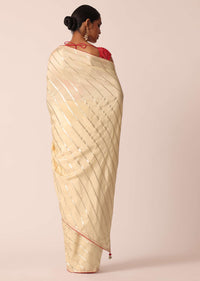 White Silk Saree With Lurex Diagonal Stripes And Unstitched Blouse Piece