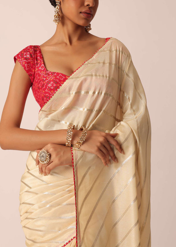 White Silk Saree With Lurex Diagonal Stripes And Unstitched Blouse Piece