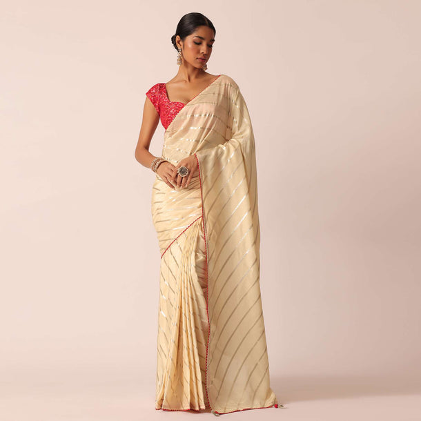 White Silk Saree With Lurex Diagonal Stripes And Unstitched Blouse Piece