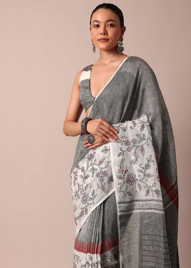 White Woven Cotton Linen Embroidered Saree With Floral Motifs And Unstitched Blouse Piece