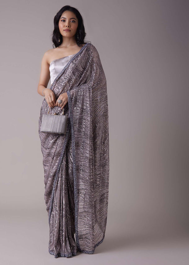 Lavender Purple Sequins Saree With An Embellished Border