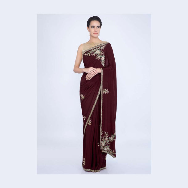 Wine crepe silk saree with embroidered butti and border only on Kalki