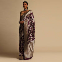 Wine Purple Banarasi Saree In Pure Handloom Silk With Woven Floral Jaal And Floral Border Along With Unstitched Blouse Piece Online - Kalki Fashion