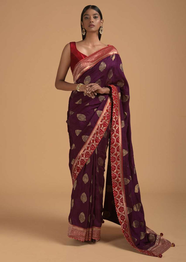 Wine Purple Saree In Dola Silk With Brocade Leaf Shaped Buttis And Contrast Red Bandhani Border Online - Kalki Fashion