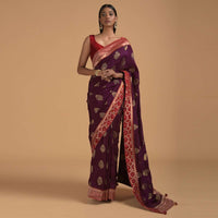 Wine Purple Saree In Dola Silk With Brocade Leaf Shaped Buttis And Contrast Red Bandhani Border Online - Kalki Fashion