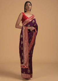 Wine Purple Saree In Dola Silk With Brocade Leaf Shaped Buttis And Contrast Red Bandhani Border Online - Kalki Fashion