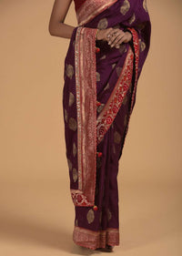 Wine Purple Saree In Dola Silk With Brocade Leaf Shaped Buttis And Contrast Red Bandhani Border Online - Kalki Fashion