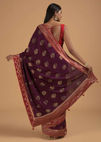 Wine Purple Saree In Dola Silk With Brocade Leaf Shaped Buttis And Contrast Red Bandhani Border Online - Kalki Fashion