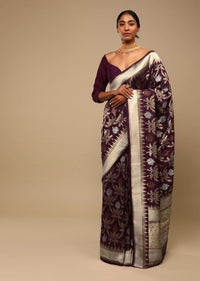 Wine Purple Saree In Art Handloom Silk With Three Toned Woven Floral Jaal, Geometric Motifs On The Pallu And Unstitched Blouse