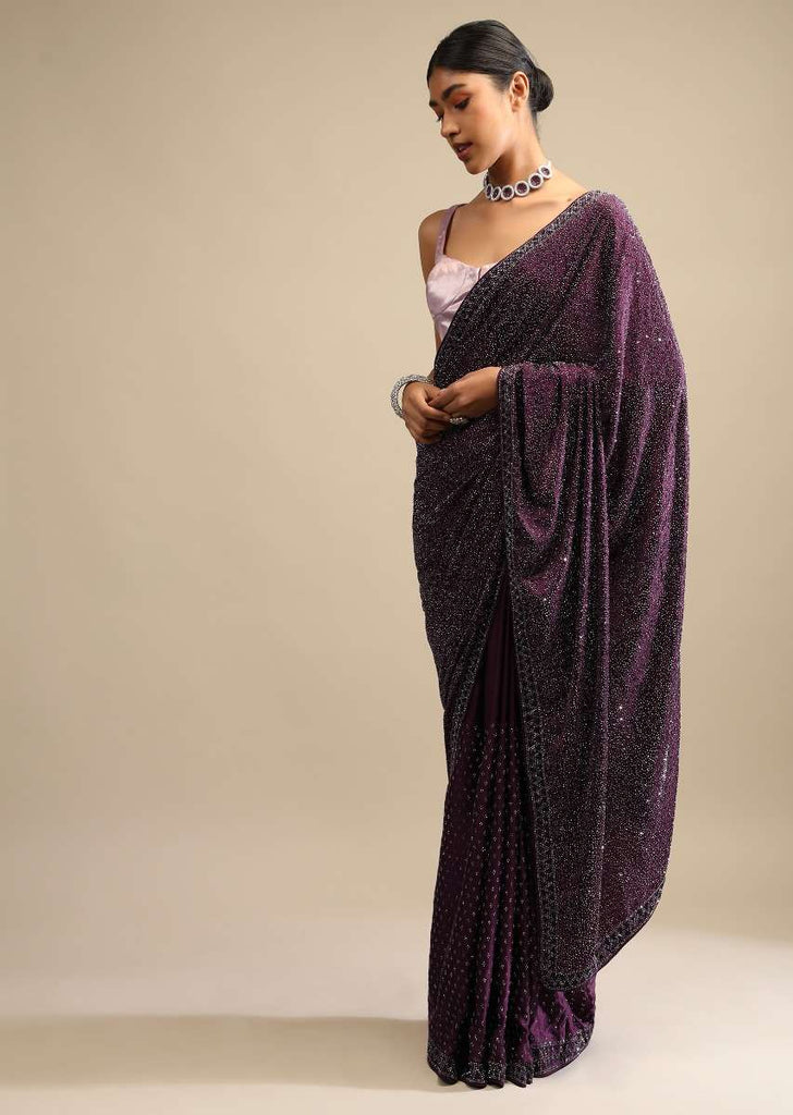 Wine Saree In Satin With A Heavy Embellished Pallu Using Scattered Sequins And Unstitched Blouse