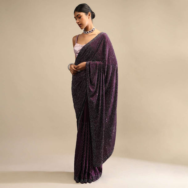 Wine Saree In Satin With A Heavy Embellished Pallu Using Scattered Sequins And Unstitched Blouse