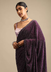 Wine Saree In Satin With A Heavy Embellished Pallu Using Scattered Sequins And Unstitched Blouse