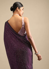 Wine Saree In Satin With A Heavy Embellished Pallu Using Scattered Sequins And Unstitched Blouse