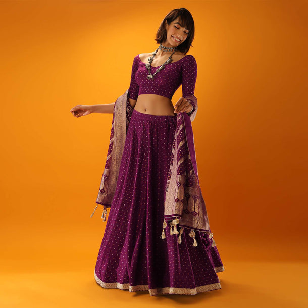 Wine Purple Lehenga In Brocade Silk With Woven Bandhani Design And Unstitched Blouse