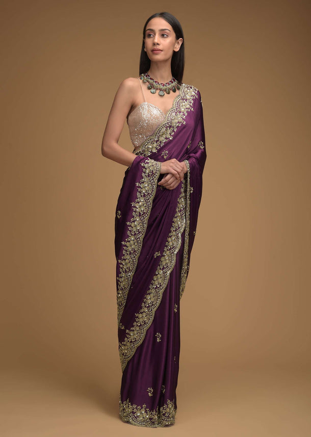 Wine Purple Saree In Satin With Hand Embroidered Scalloped Border And Floral Buttis Along With Unstitched Blouse