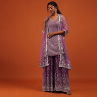 Wine Sharara Suit In Georgette With A Net Dupatta