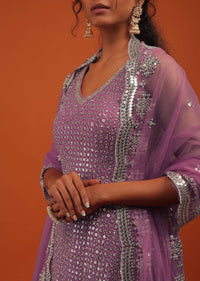 Wine Sharara Suit In Georgette With A Net Dupatta