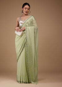 Moss Green Chiffon Saree With Stone Embellishments And Satin Border