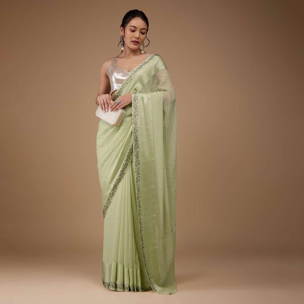 Moss Green Chiffon Saree With Stone Embellishments And Satin Border