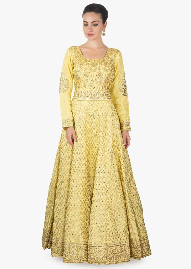 Yellow anarkali suit adorn in digital print further embellished in sequin only on Kalki