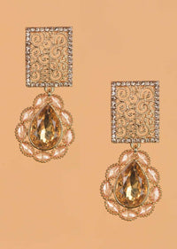 Yellow Crystal Studded Danglers With Spiral Carved Geometric Motif And Floral Motif Online - Kalki Fashion