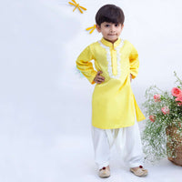 Kalki Boys Yellow Kurta With Dori Work Paired With White Dhoti Pants By Fayon Kids
