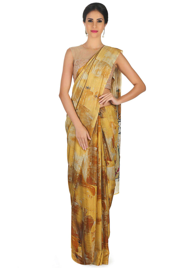 Yellow and mustard self printed saree only on Kalki