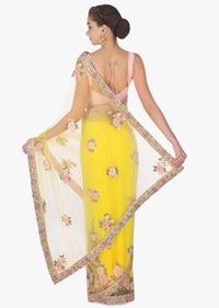 Yellow net saree in 3D flower with velvet patch