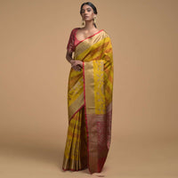 Yellow Pure Handloom Saree In Tussar Silk With Stripes And Woven Floral Border Online - Kalki Fashion