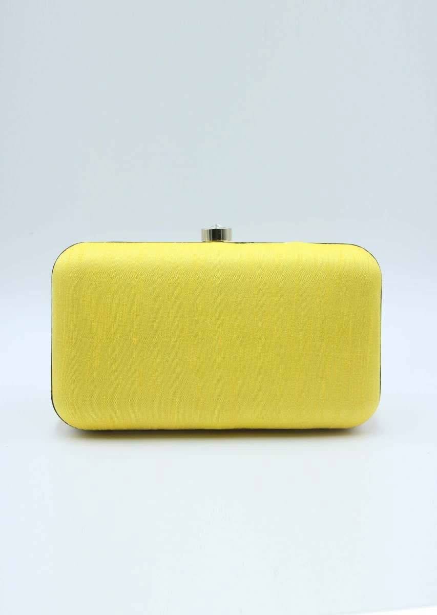 Yellow sling clutch bag embellished in zardosi floral embroidery