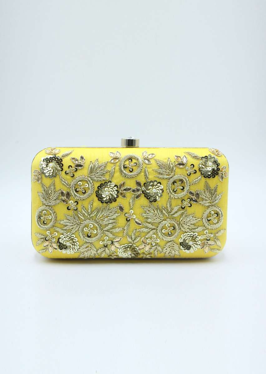 Yellow sling clutch bag embellished in zardosi floral embroidery