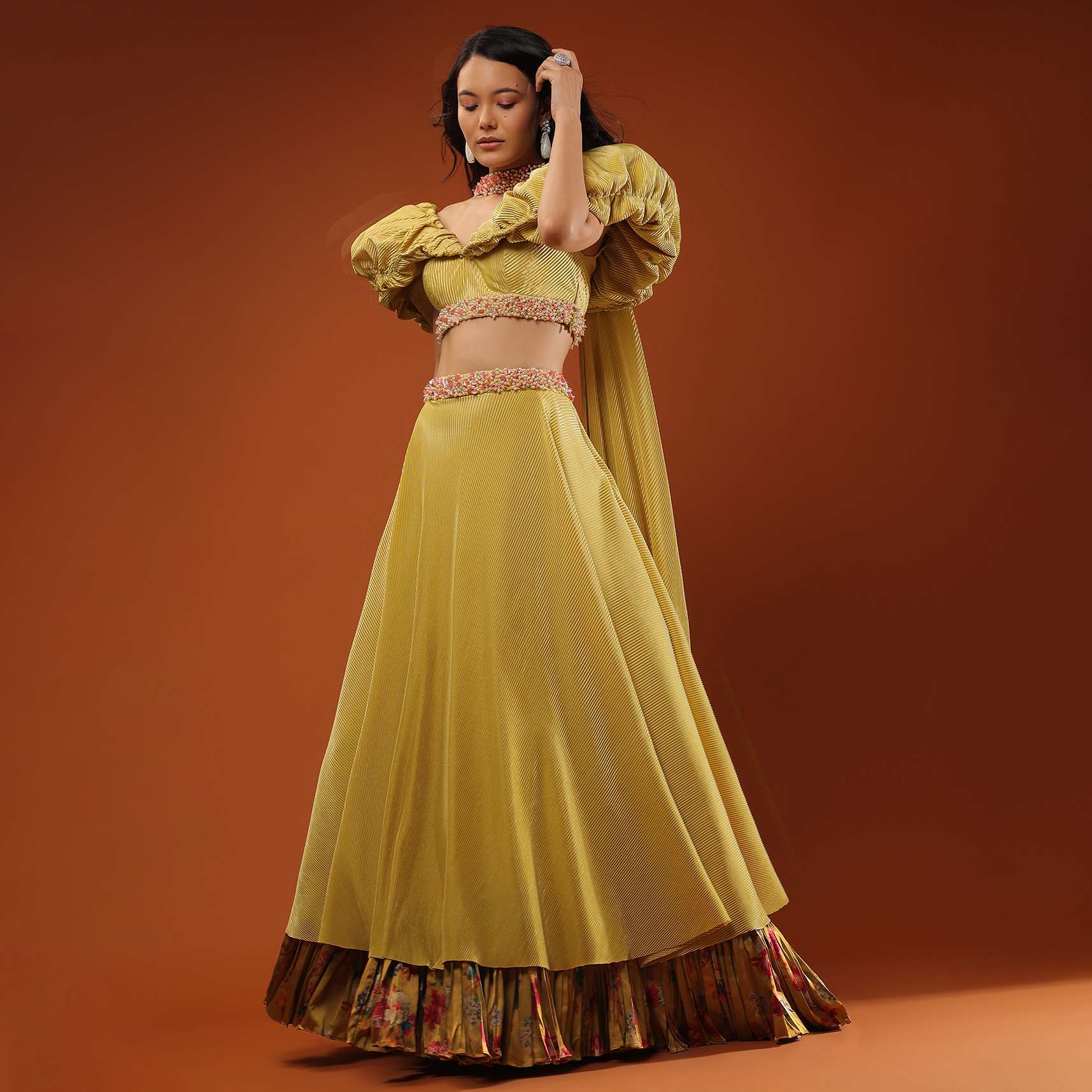 Yellow Crush Lehenga And A Crop Top In Moti Embroidery, Crop Top Comes In Balloon Sleeves Till The Yoke