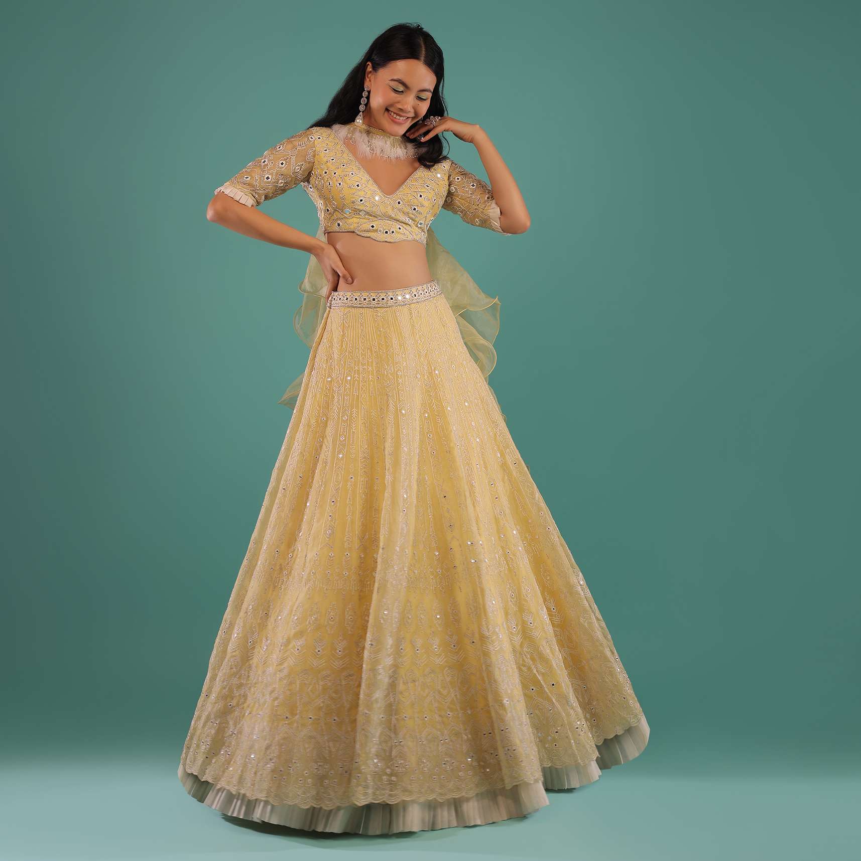 Yellow Lehenga Choli In Organza With Aari Embroidered Tribal Motifs And Feather Detailed Ruffle Dupatta