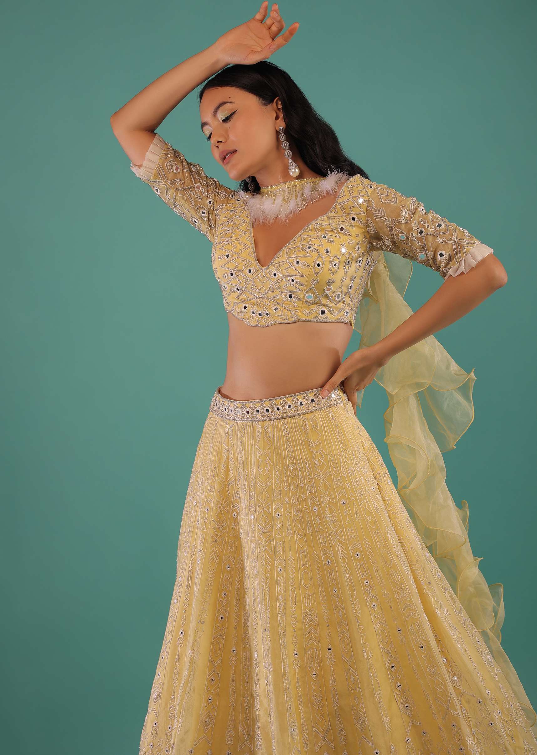 Yellow Lehenga Choli In Organza With Aari Embroidered Tribal Motifs And Feather Detailed Ruffle Dupatta