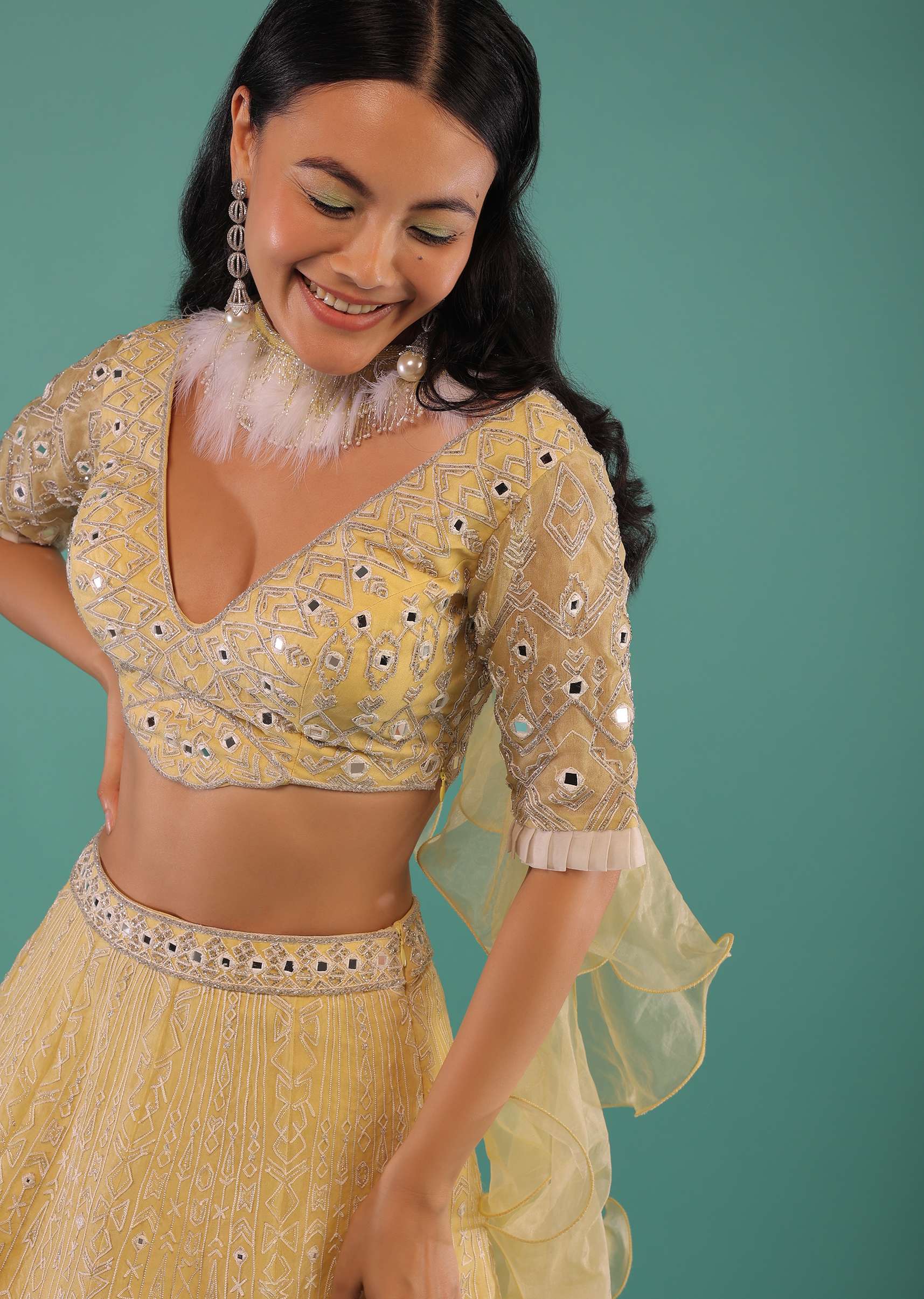 Yellow Lehenga Choli In Organza With Aari Embroidered Tribal Motifs And Feather Detailed Ruffle Dupatta