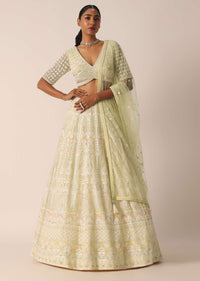 Yellow Net Embroidered Blouse And Skirt Set