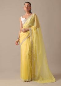 Yellow Organza Saree With Scallop Border And Unstitched Blouse Piece