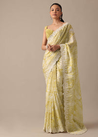 Yellow Printed Satin Saree With Embroidered Detail And Unstitched Blouse Piece