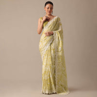 Yellow Printed Satin Saree With Embroidered Detail And Unstitched Blouse Piece