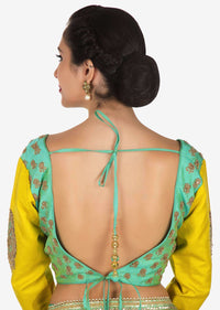 Yellow saree in cotton with ready stitched blouse embellished in zari butti embroidery only on Kalki