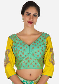 Yellow saree in cotton with ready stitched blouse embellished in zari butti embroidery only on Kalki