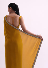 Yellow Saree In Satin With Mirror Work And Unstitched Blouse Fabric