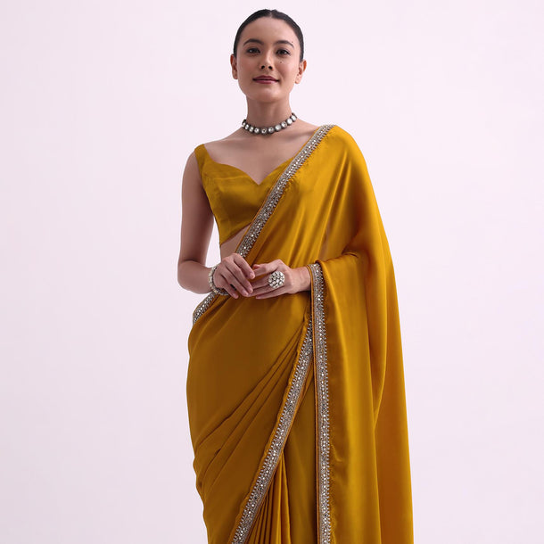 Yellow Saree In Satin With Mirror Work And Unstitched Blouse Fabric