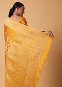 Yellow Satin Organza Saree With Moroccan Style Jaal And Unstitched Blouse Piece