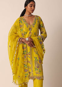 Yellow Silk Kurta Set With Shell Hangings And Mirror Work