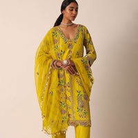 Yellow Silk Kurta Set With Shell Hangings And Mirror Work