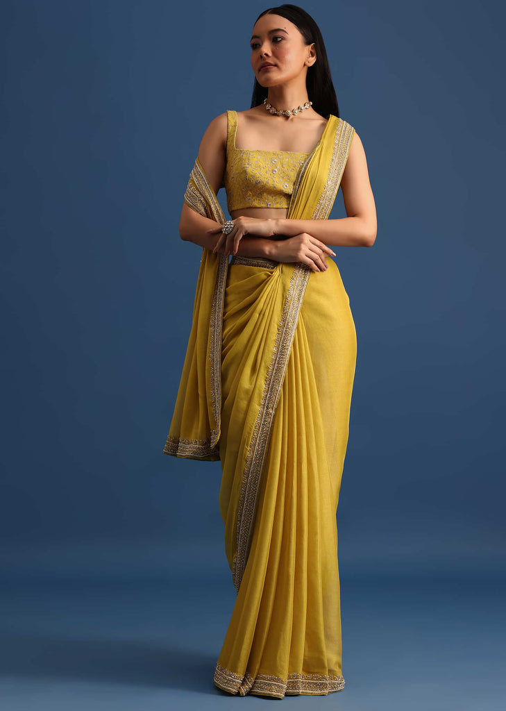 Yellow Tissue Organza Saree With Embroidered Border And Unstitched Blouse