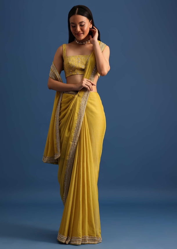 Yellow Tissue Organza Saree With Embroidered Border And Unstitched Blouse