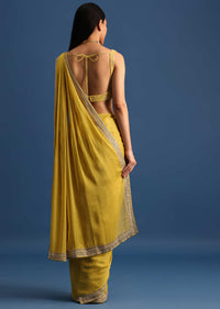 Yellow Tissue Organza Saree With Embroidered Border And Unstitched Blouse